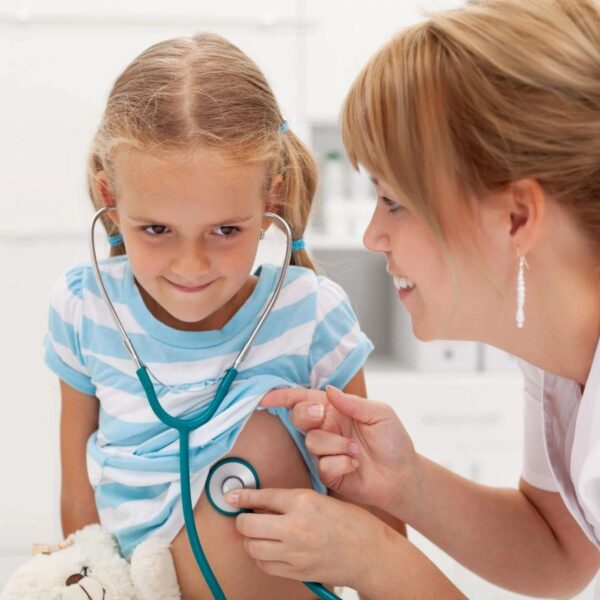 Little girl at the doctor for a checkup